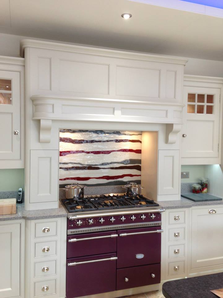 Traditional kitchen with range cooker and decorative mantle