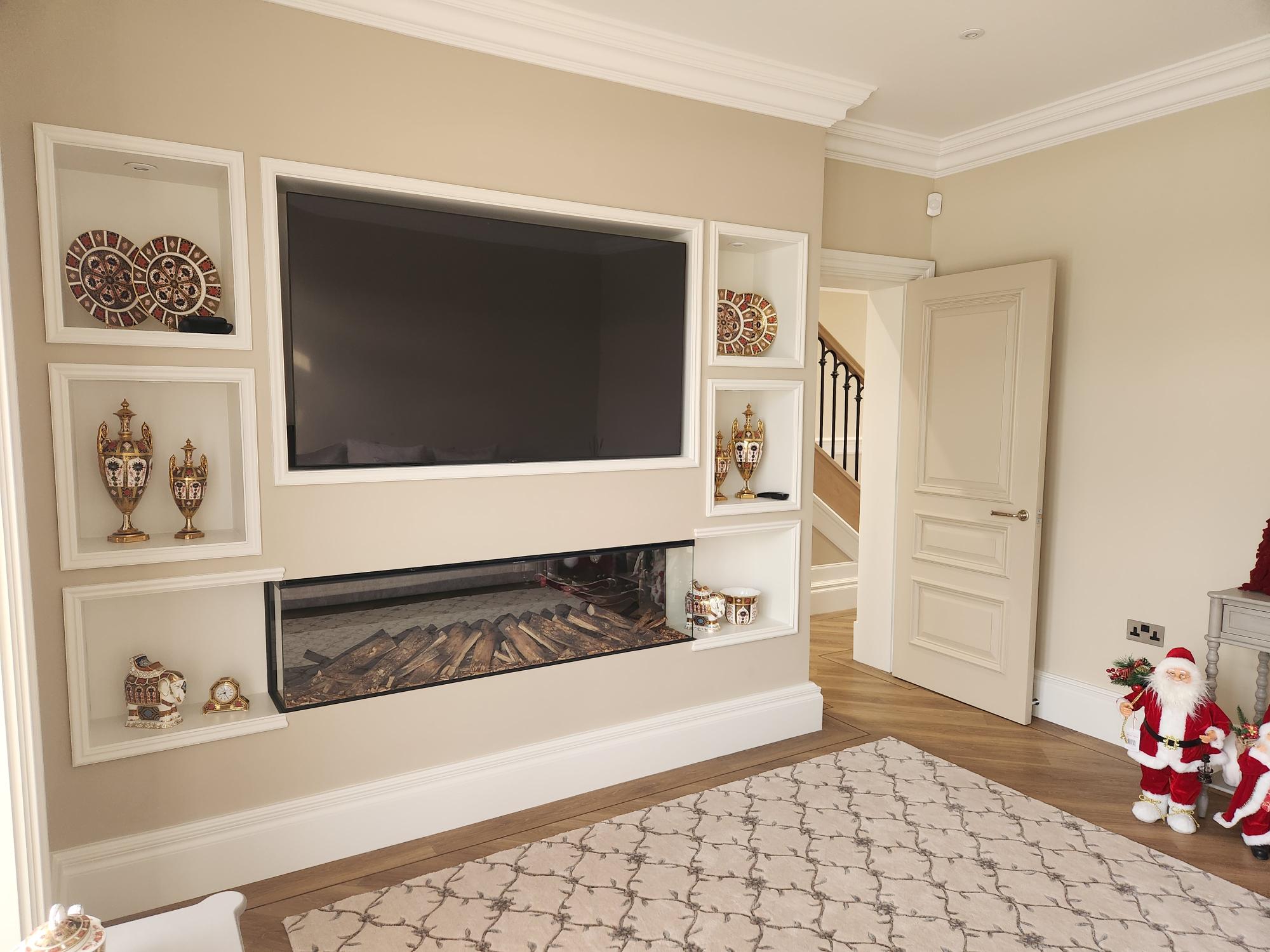 Media wall with integrated TV, display niches and linear fireplace
